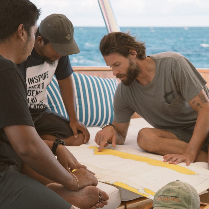 David De Rothschild studying a map